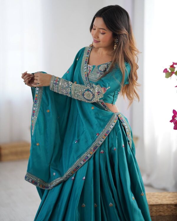 Sea Green Lehenga Choli with Foil Work Border